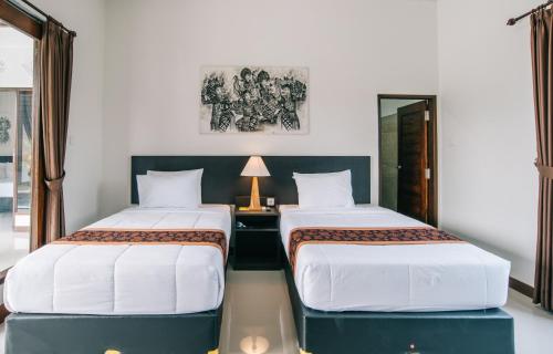 Imagen de la habitación del Hotel Adil Villa & Resort. Foto 4