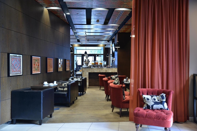 Imagen del bar/restaurante del Hotel Adina Apartment Hamburg Michel. Foto 7