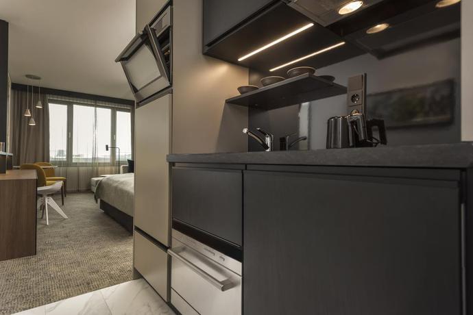 Imagen de la habitación del Hotel Adina Apartment Hotel Frankfurt Westend. Foto 11