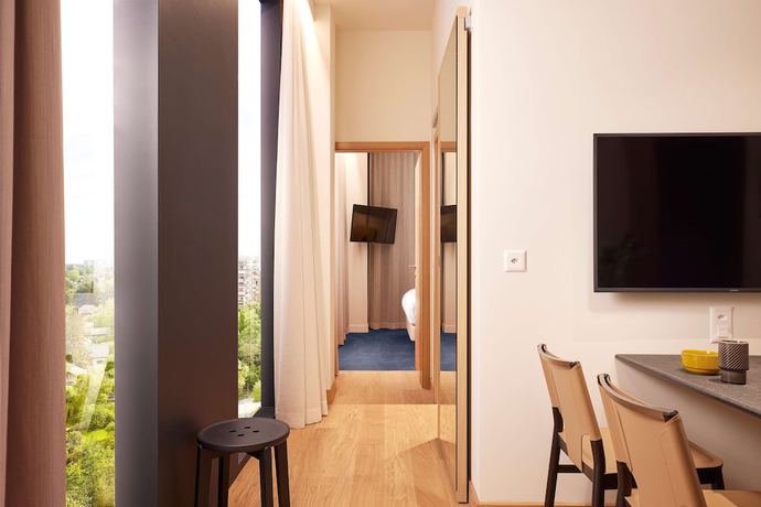 Imagen de la habitación del Hotel Adina Apartment Hotel Geneva. Foto 13