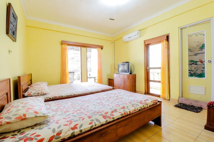 Imagen de la habitación del Hotel Adinda Beach and Villa. Foto 11