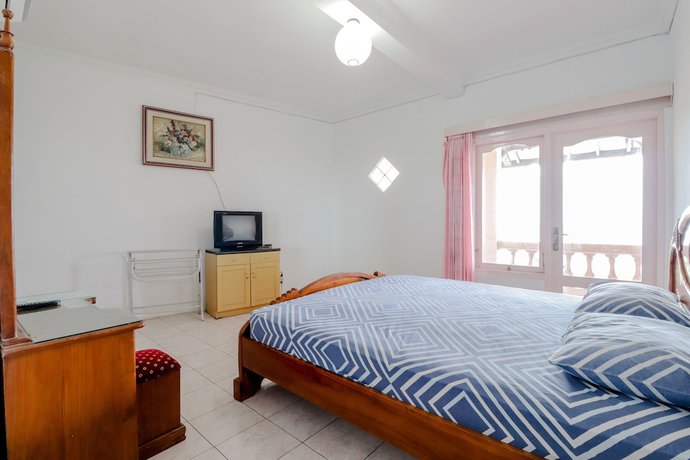 Imagen de la habitación del Hotel Adinda Beach and Villa. Foto 17