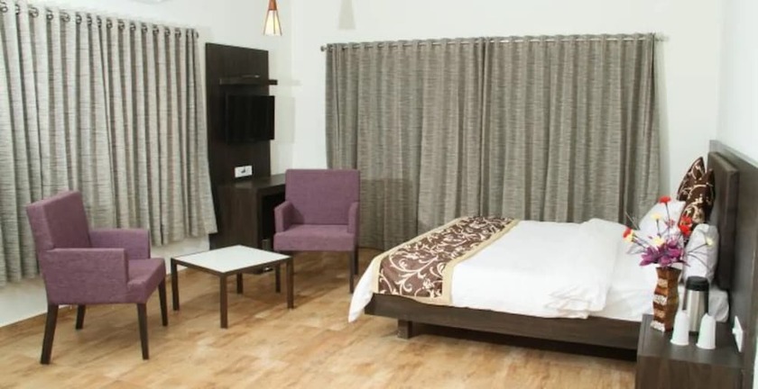 Imagen de la habitación del Hotel Aditya. Foto 15