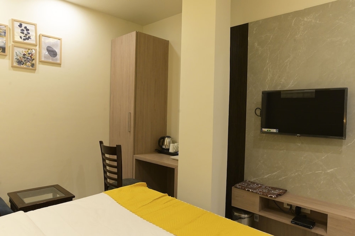 Imagen de la habitación del Hotel Aditya Grand - Bhopal. Foto 5