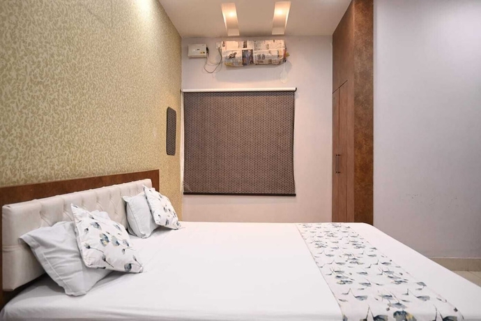 Imagen de la habitación del Hotel Aditya Guest House. Foto 5