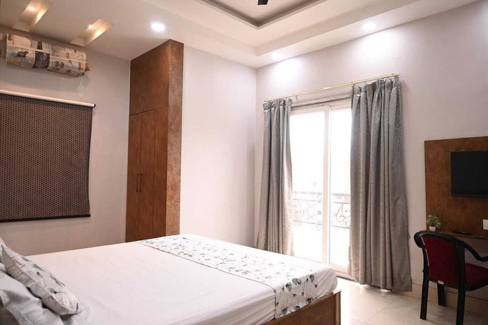 Imagen de la habitación del Hotel Aditya Guest House. Foto 8