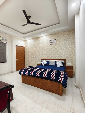 Imagen de la habitación del Hotel Aditya Guest House. Foto 9