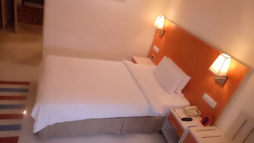 Imagen de la habitación del Hotel Aditya Hometel Hyderabad. Foto 12