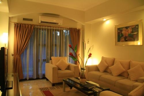 Imagen de la habitación del Hotel Aditya Mansions Apartment. Foto 7