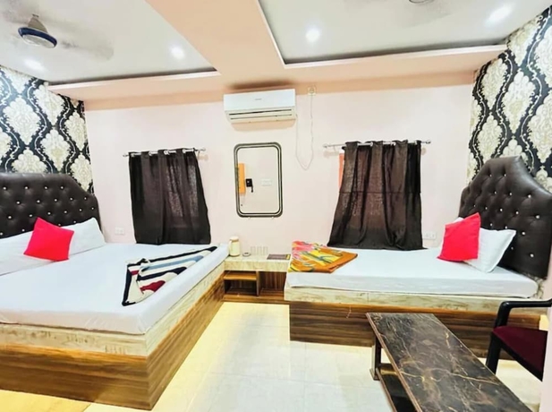 Imagen de la habitación del Hotel Aditya Varanasi. Foto 2