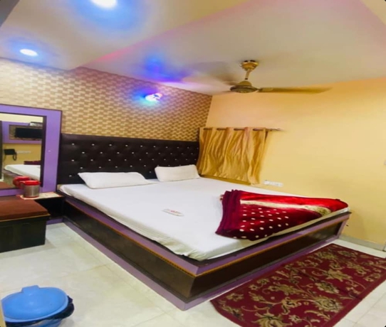 Imagen de la habitación del Hotel Aditya Varanasi. Foto 7