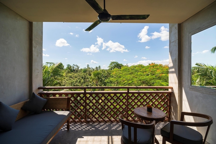 Imagen de la habitación del Hotel Adiwana Bisma. Foto 8