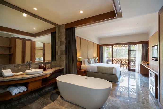 Imagen de la habitación del Hotel Adiwana Bisma. Foto 9