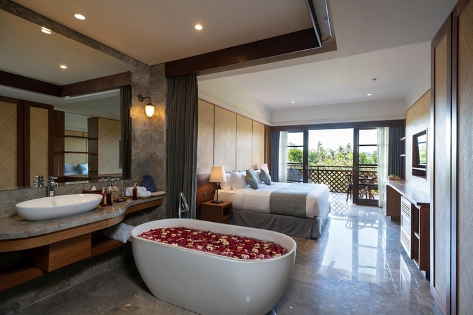 Imagen de la habitación del Hotel Adiwana Bisma. Foto 10