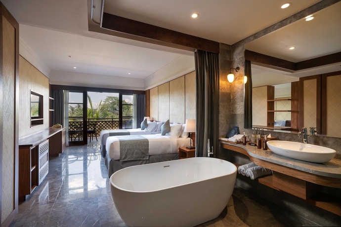 Imagen de la habitación del Hotel Adiwana Bisma. Foto 14