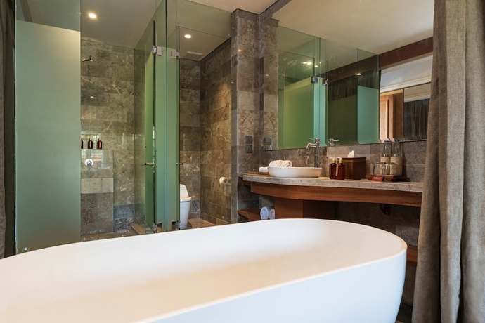 Imagen de la habitación del Hotel Adiwana Bisma. Foto 15