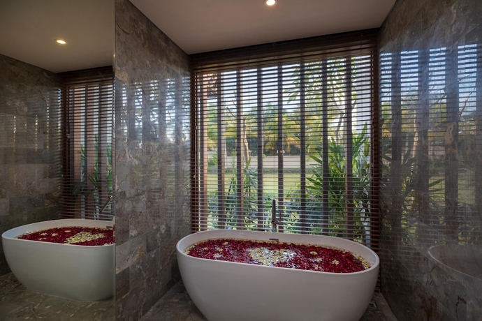 Imagen de la habitación del Hotel Adiwana Bisma. Foto 18