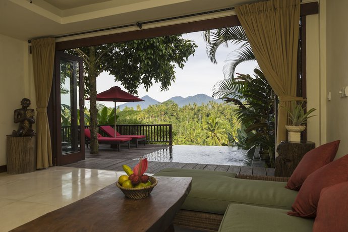 Imagen de la habitación del Hotel Adiwana Dara Ayu Villas. Foto 5