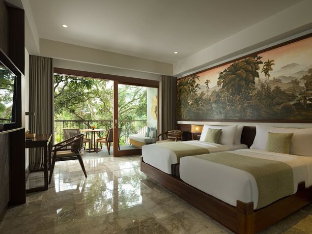 Imagen de la habitación del Hotel Adiwana Suweta. Foto 11