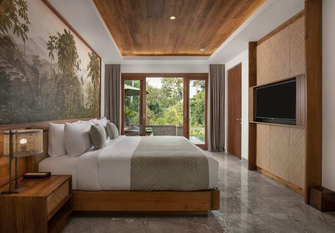 Imagen de la habitación del Hotel Adiwana Suweta. Foto 12