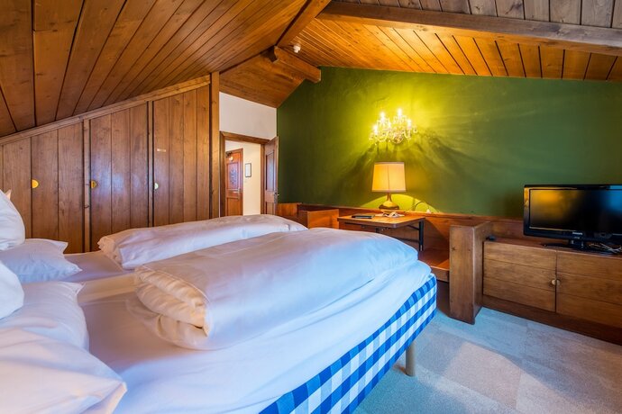 Imagen de la habitación del Hotel Adler Suite and Stube. Foto 16