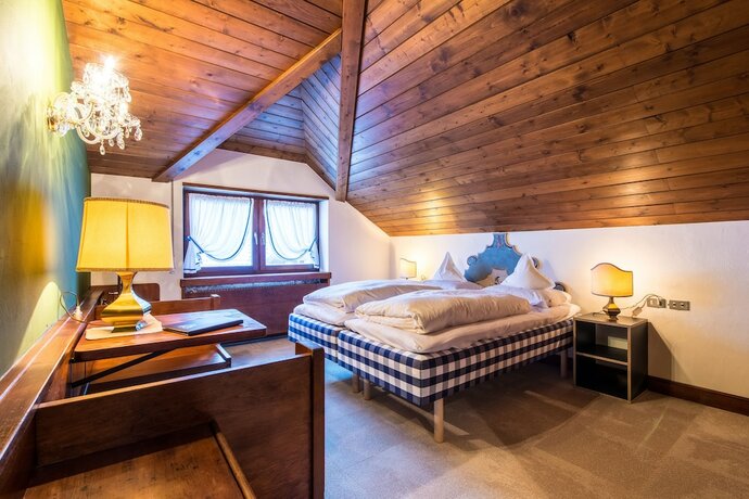 Imagen de la habitación del Hotel Adler Suite and Stube. Foto 19