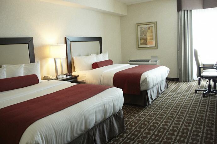 Imagen de la habitación del Hotel Admiral Inn Mississauga Toronto. Foto 18