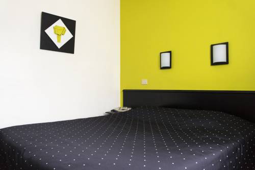 Imagen de la habitación del Hotel Adoma. Foto 11