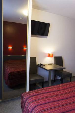 Imagen de la habitación del Hotel Adoma. Foto 14