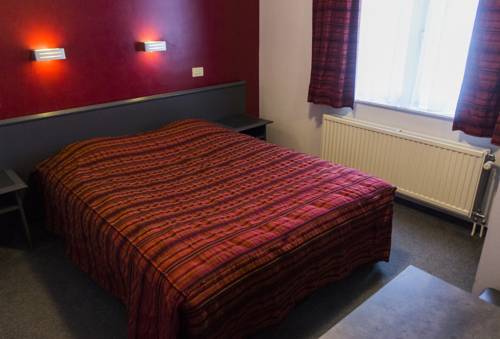 Imagen de la habitación del Hotel Adoma. Foto 15