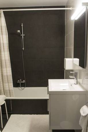 Imagen de la habitación del Hotel Adoma. Foto 16