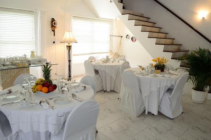 Imagen del bar/restaurante del Hotel Adonai Boutique. Foto 2