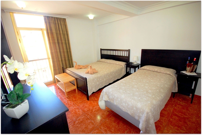 Imagen de la habitación del Hotel Adonis Capital. Foto 10