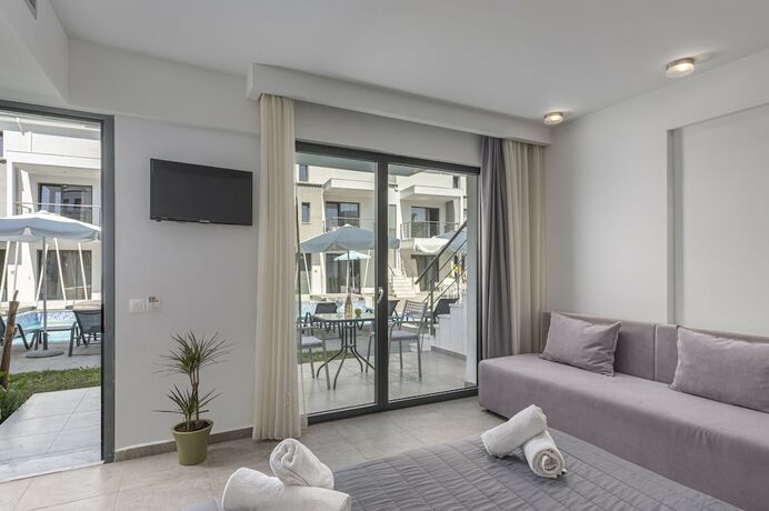Imagen de la habitación del Hotel Adonis Luxury Village. Foto 18