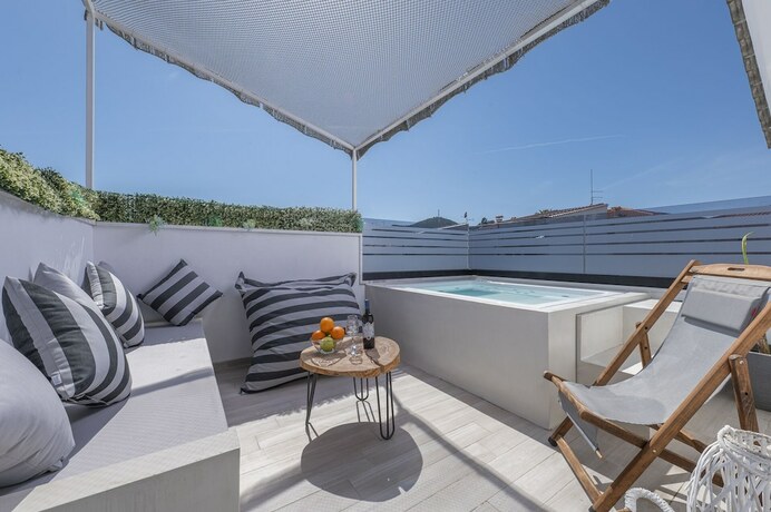 Imagen de la habitación del Hotel Adonis Luxury Village. Foto 20