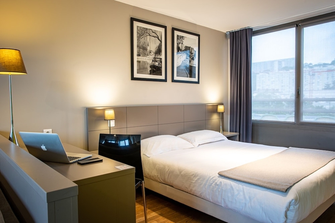 Imagen de la habitación del Hotel Adonis Lyon Dock Ouest. Foto 7