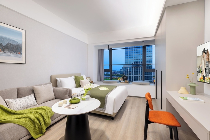 Imagen de la habitación del Hotel Adoor Suites Songbei Suzhou. Foto 3