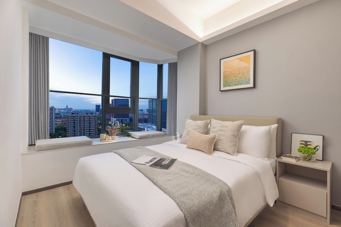 Imagen de la habitación del Hotel Adoor Suites Songbei Suzhou. Foto 5