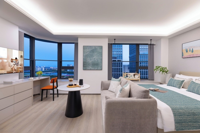 Imagen de la habitación del Hotel Adoor Suites Songbei Suzhou. Foto 7