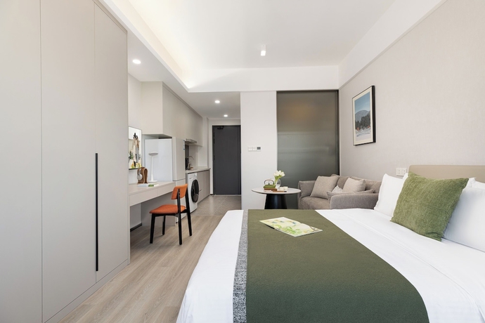 Imagen de la habitación del Hotel Adoor Suites Songbei Suzhou. Foto 8