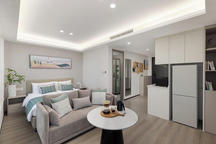 Imagen de la habitación del Hotel Adoor Suites Songbei Suzhou. Foto 9