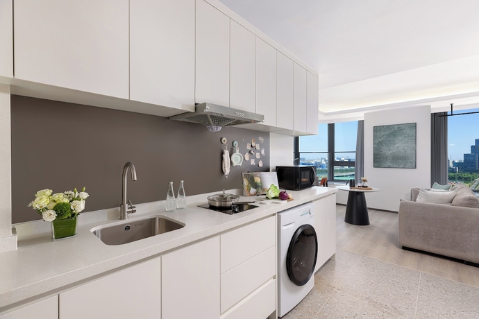 Imagen de la habitación del Hotel Adoor Suites Songbei Suzhou. Foto 11