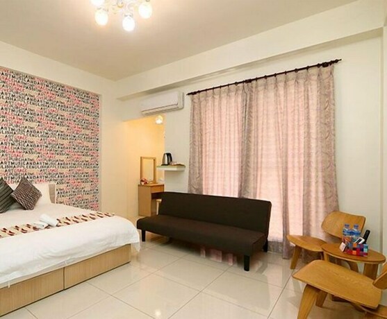 Imagen de la habitación del Hotel Adore, Luodong. Foto 7