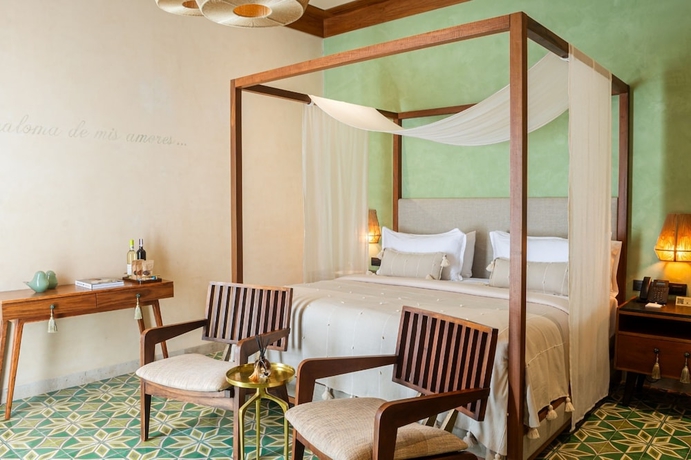 Imagen de la habitación del Hotel Adoro Boutique. Foto 4