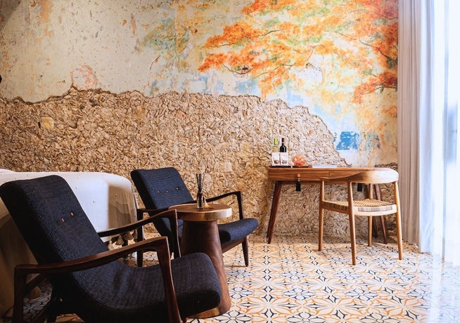 Imagen de la habitación del Hotel Adoro Boutique. Foto 5