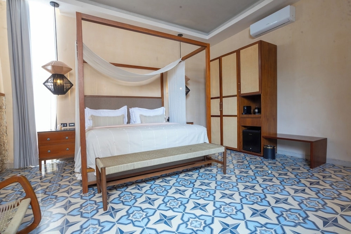 Imagen de la habitación del Hotel Adoro Boutique. Foto 6