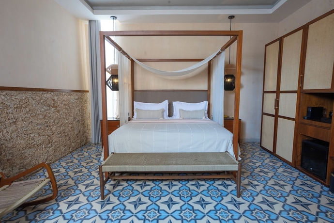 Imagen de la habitación del Hotel Adoro Boutique. Foto 7
