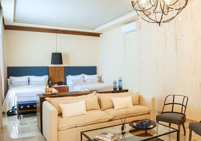 Imagen de la habitación del Hotel Adoro Boutique. Foto 8