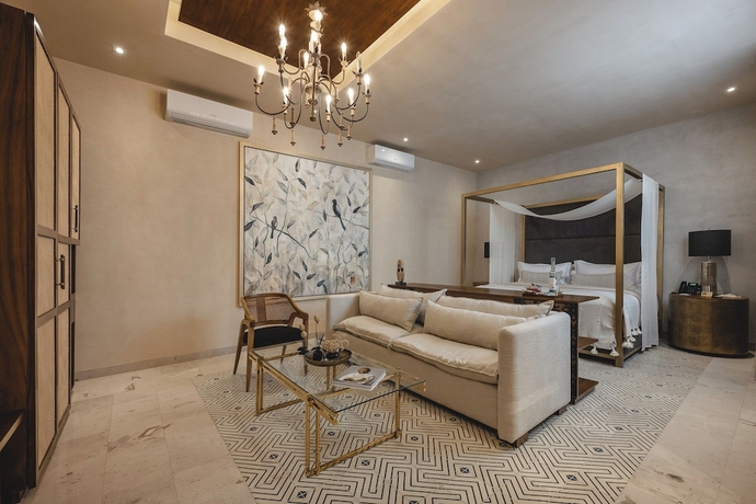 Imagen de la habitación del Hotel Adoro Boutique. Foto 10