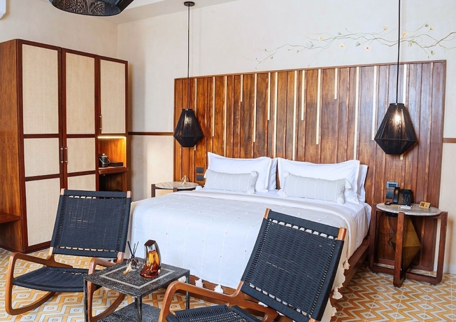 Imagen de la habitación del Hotel Adoro Boutique. Foto 12